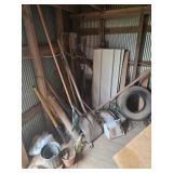Shovels, pick ax, hoe, rake, shelves, corner lot