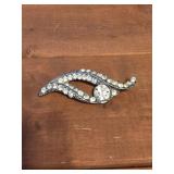 vintage silver-tone rhinestone brooch shaped like