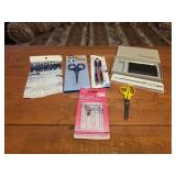 Pens, scissors,sewing needles