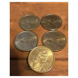 Five 2000-P Sacagawea golden dollar coins