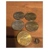 Five 2000-P Sacagawea golden dollar coins