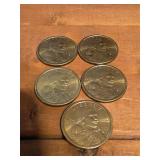 Five 2000-P Sacagawea golden dollar coins