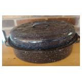 black speckled enamelware covered oval roasting