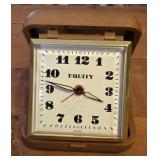 vintage Equity folding travel alarm clock housed