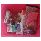 Light bulbs, oven mitts and more in a tote......