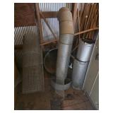 A large cauldron, pipe and wire