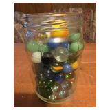 clear glass jar filled with an assorted