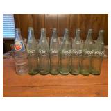 vintage glass soda bottles, featuring one Royal