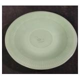 Vintage green jadeite saucer. Has a crack