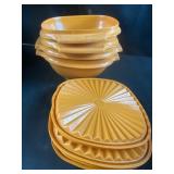 Orange Tupperware bowls with lids