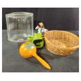 Home decor including a basket, a frog sponge