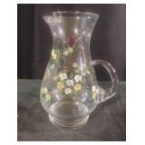 glass pitcher featuring a delicate hand-painted