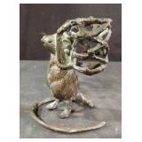 vintage decorative brass figurine of a standing