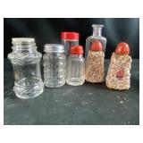 Salt, pepper, shakers, and glass bottles