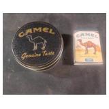 Camel metal tin can and a Zippo metal tin can. No