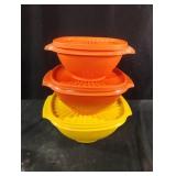 Vintage Tupperware mixing bowls with lids