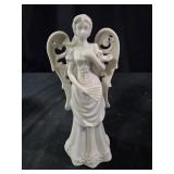 vintage white porcelain angel figurine with