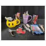 Mugs and ball jars with pens and pencils, office