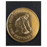 gold prospector-themed commemorative token
