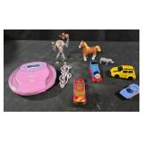 Assorted toys, cats, street CD player