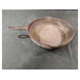 Vintage cast iron frying pan.  H8 on the back