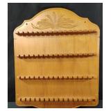 vintage wooden wall-hanging display rack designed