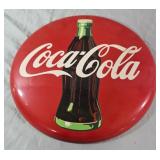 12" round metal Coca-Cola "button" sign featuring