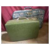 Escort and American tourisher suitcases