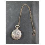 vintage hunter-case pocket watch featuring a