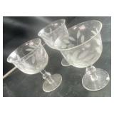 Three etched wine glasses with floral design