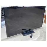 60' Vizio TV w/ remote (powers on) (needs repair)