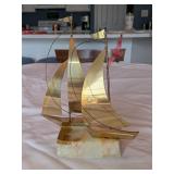 Brass Ship On The Rocks