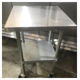 STAINLESS TOP ROLLING WORK TABLE 24' x 24'