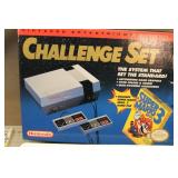 NES Console, Light Gun, (2) Controllers & Assorted