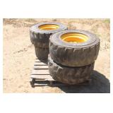 (4) 12-16.5 NHS Skid Steer Tires W/ Rims