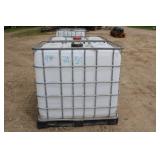 (2) Poly Tanks In Cages