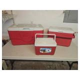 Three Red and White Plastic Coolers