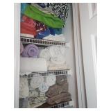 Linens, Towels, and Bedding on Wire Shelves