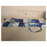 Two Foldable Beach Umbrellas with Striped Covers