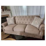 Beige Tufted Three-Seater Sofa with Rolled Arms an