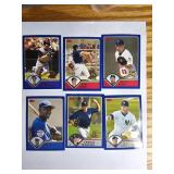 Six Topps Baseball Cards Featuring Various Players