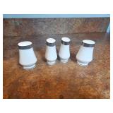Four White Ceramic Salt and Pepper Shakers