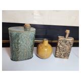 Three Ceramic Bottles with Cork Tops