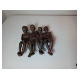 Cast Iron Figurine of Four Sitting Figures