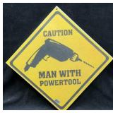 'Caution, Man With Powertool' 11'sq Sign