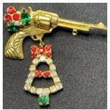 Gold Tone Revolver & Bell Christmas Brooch