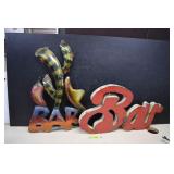 Two Metal Bar Signs