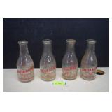 Four Vintage United Dairy Quart Glass Bottles
