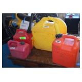 Four Plastic Gas Cans