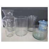 Six Vases, Bottles and a Blue Canister